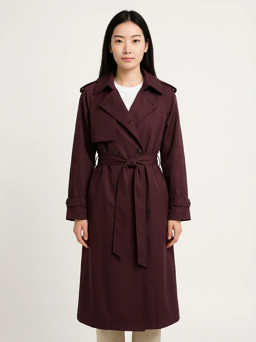 Model wearing burgundy trench coat after virtual try-on with Tryonr AI