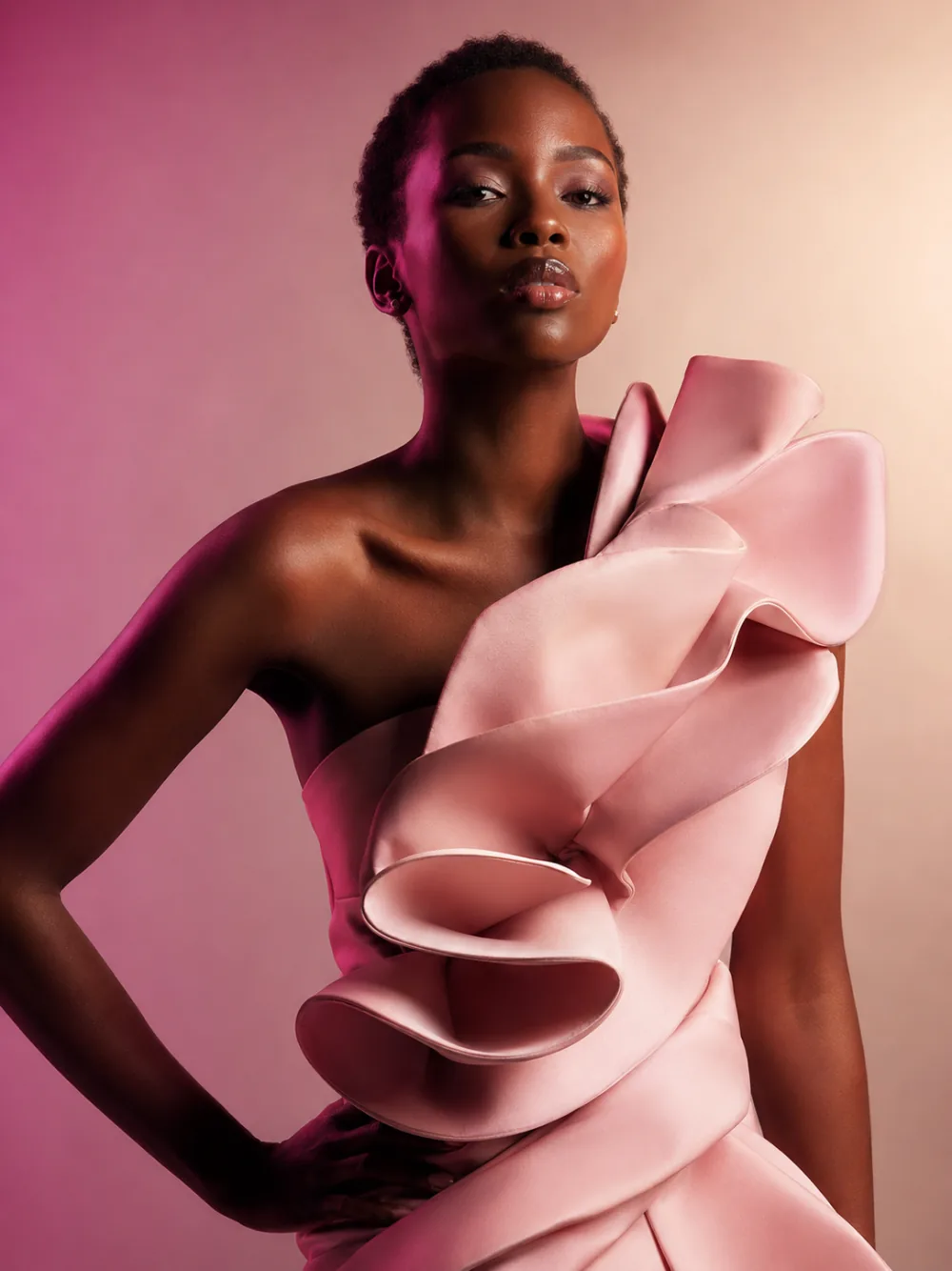 Gemini Omni fashion portrait — model in sculptural pink dress with magenta lighting